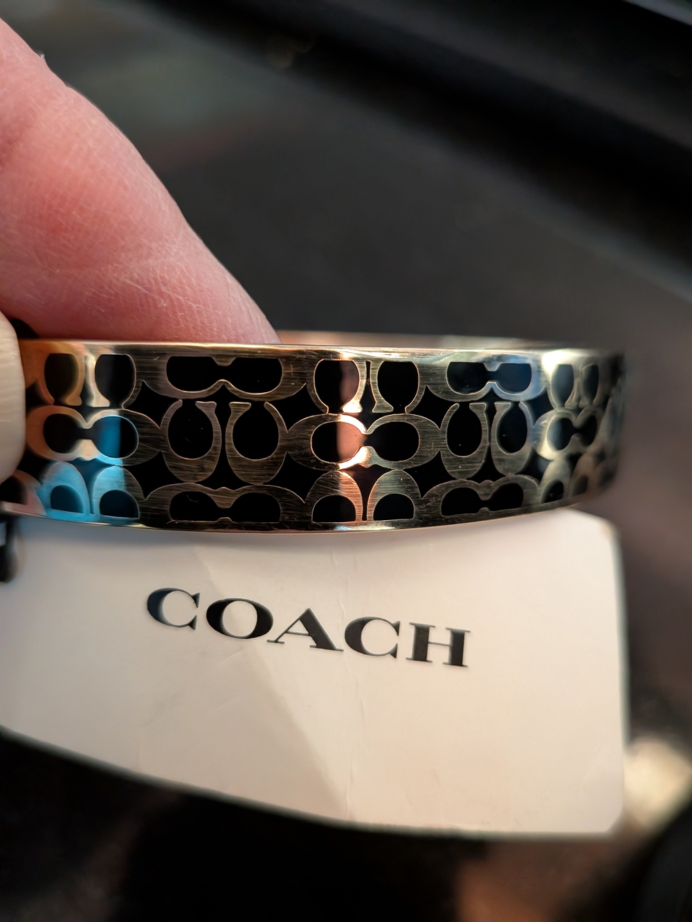 Coach Gold-Tone Bangle with Black Logo Inlay